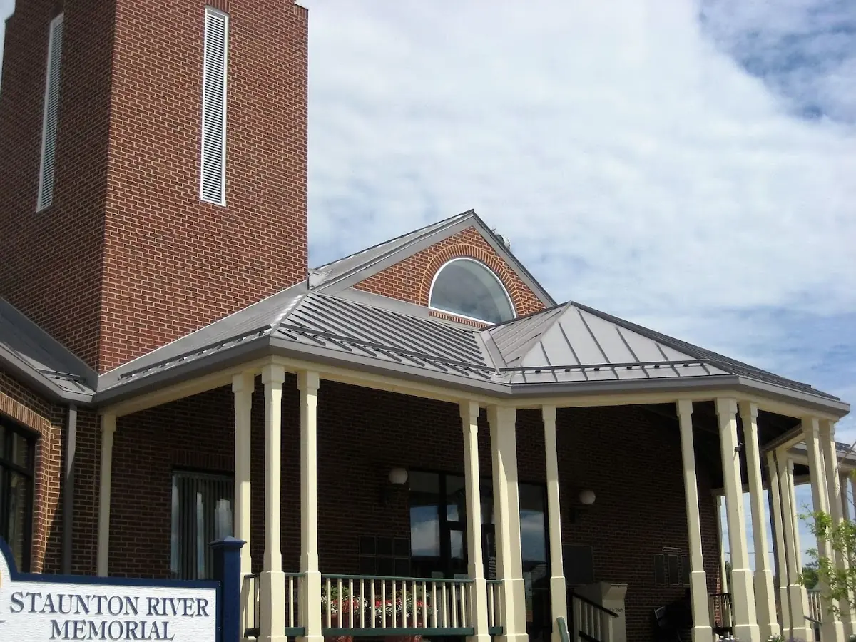 Skilled roofing craftsmen working on a residential roof in Browntown